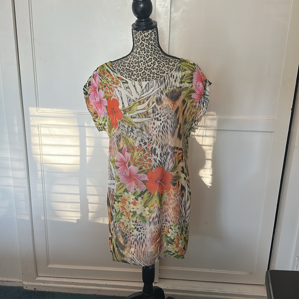 Tropical Floral and Animal Print Mini Dress flows gracefully